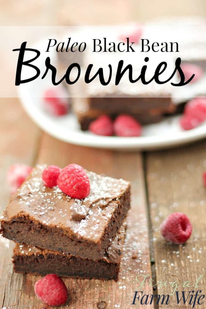 Image shows a few brownies on a table with text that reads "Paleo Black Bean Brownies"