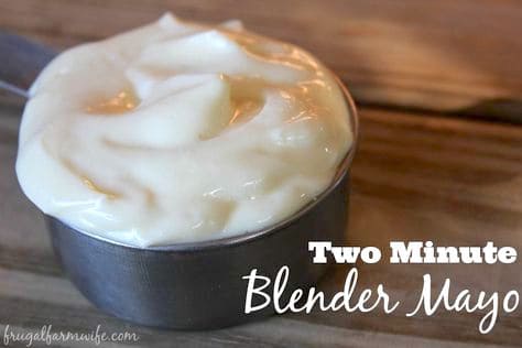 Image shows a metal bowl of mayonaise with text that reads "Two Minute Blender Mayo"