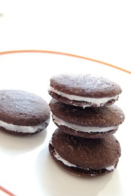 Photo shows a stack of gluten-free Oreo copycat cookies on a plate