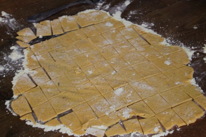 Photo shows dough for the sweet potato crackers rolled out on a table 