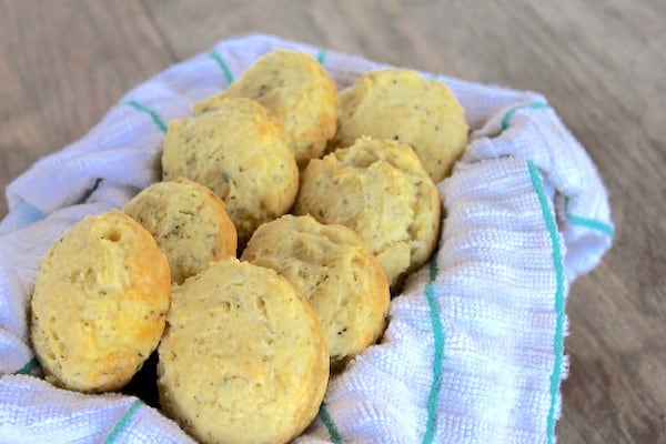 Images shows a basket full of herb biscuits