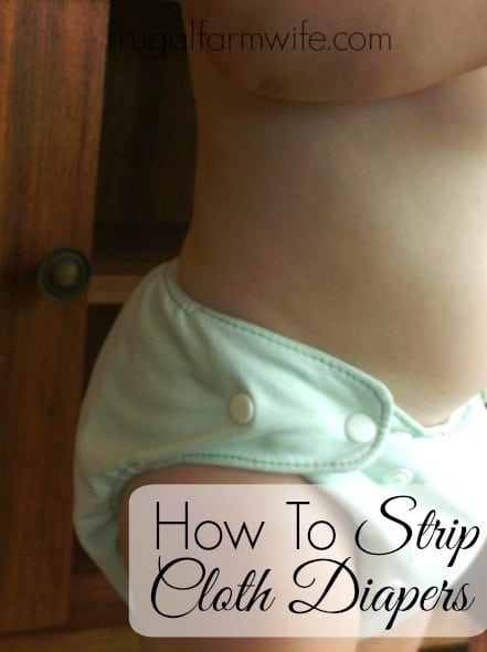 Image shows a toddler wearing a cloth diaper with text that reads "How to Strip Cloth Diapers"