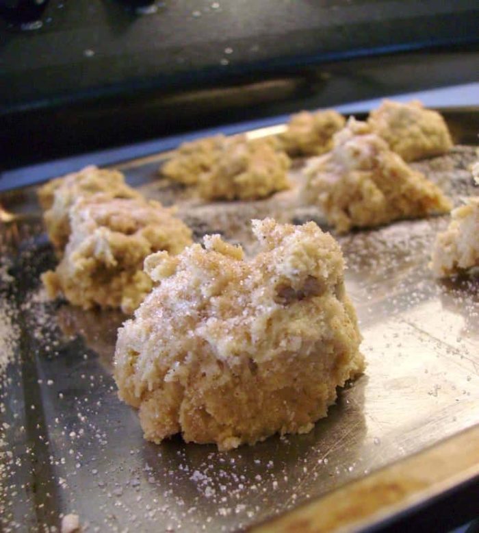 Image shows a ball of cookie dough on a cookie sheet