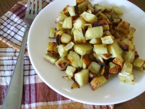 Photo shows a plate of white sweet potatoes, pan fried