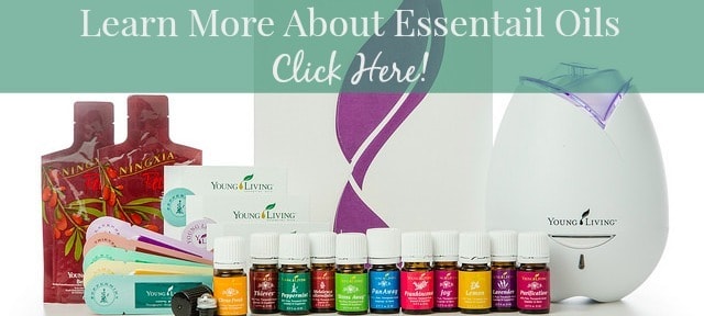 Image shows about a doxen small bottles of Young Living Essential oils with a diffuser and other components of a starter pack. Text above reads "Learn more about essential oils, click here!" 
