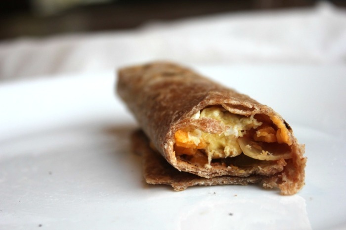 Photo shows a burrito made with a spelt tortilla