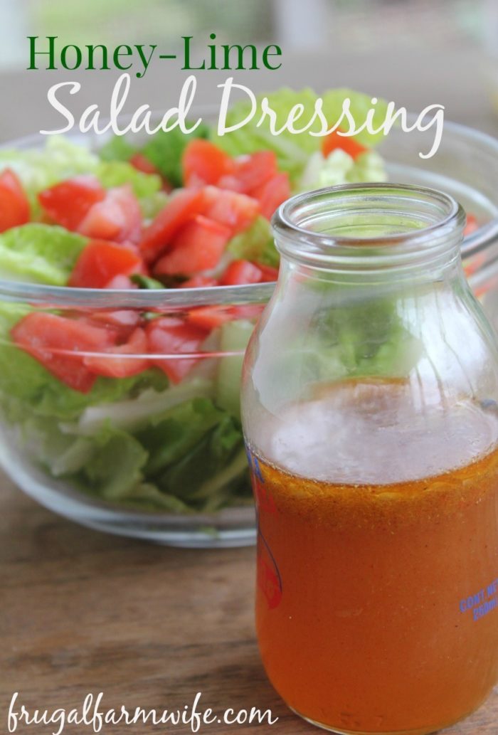 Photo shows a bowl of salad with a jar of dressing in front and text that reads "Honey-Lime Salad Dressing"