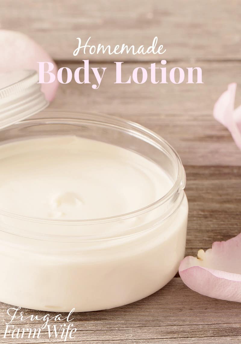 Image shows a close up of a jar of white homemade body lotion sitting on a wood table. Text reads "Homemade Body Lotion"