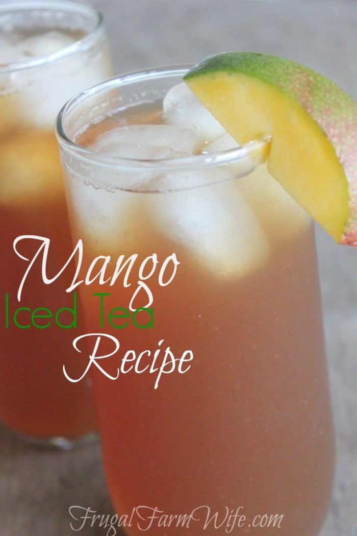 Image shows a tall glass of mango iced tea with text that reads "Mango Iced Tea Recipe"