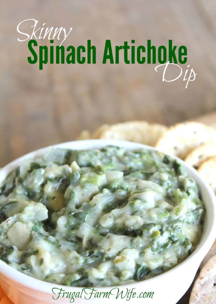 Image shows a close up of a bowl of spinach artichoke dip with text that reads "Skinny Spinach Artichoke Dip"
