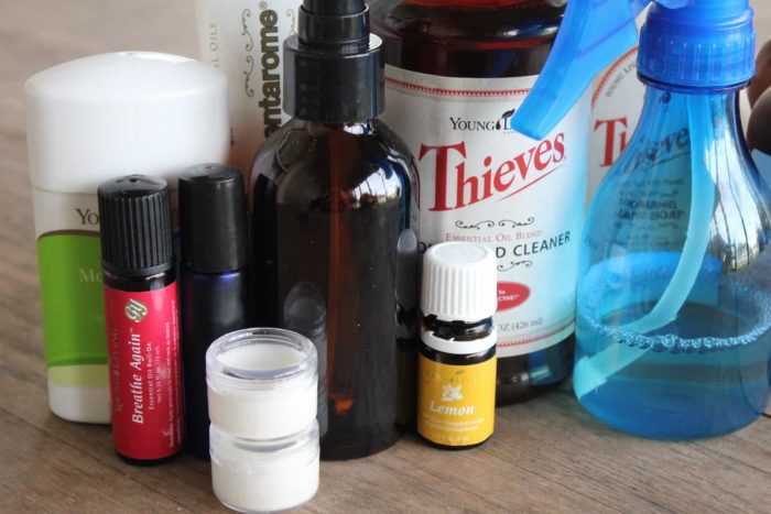 Image shows a close up of a number of essential oils to be used for cleaning products
