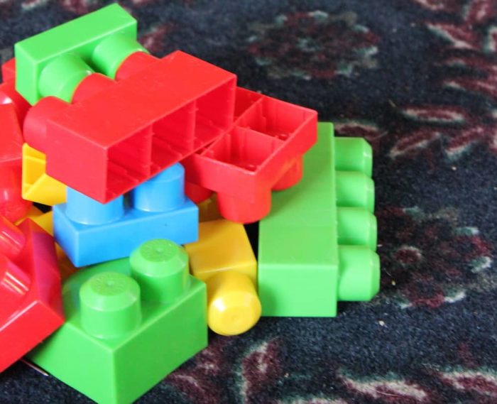 Image shows a pile of large toy blocks