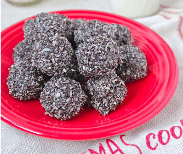 Photo of no bake chocolate balls on a red plate