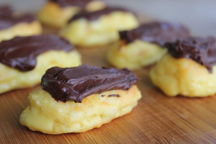 Photo shows gluten free chocolate eclairs on a table 