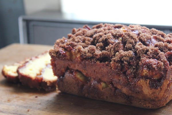 Photo shows a loaf of sliced apple streusel bread