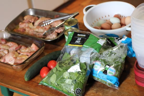 Image shows a table full of ingredients for prepping meals