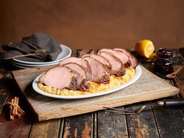 Image shows a pork loin on a platter
