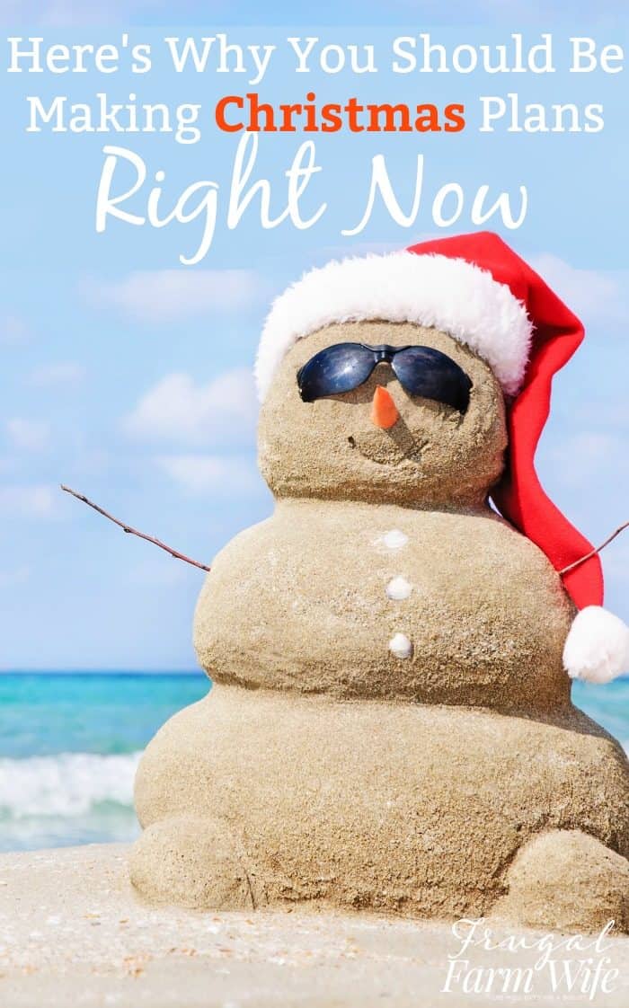 Image shows a snow man on a beach made of sand, with text that reads "Here's Why You Should Be Making Christmas Plans Right Now"