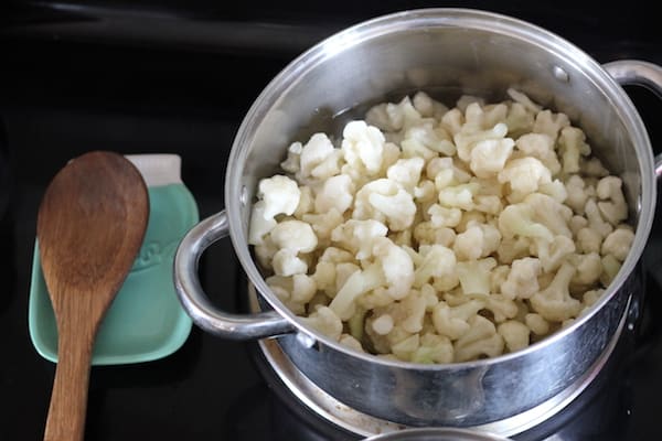 Photo shows a pan of low carb cauliflower grits