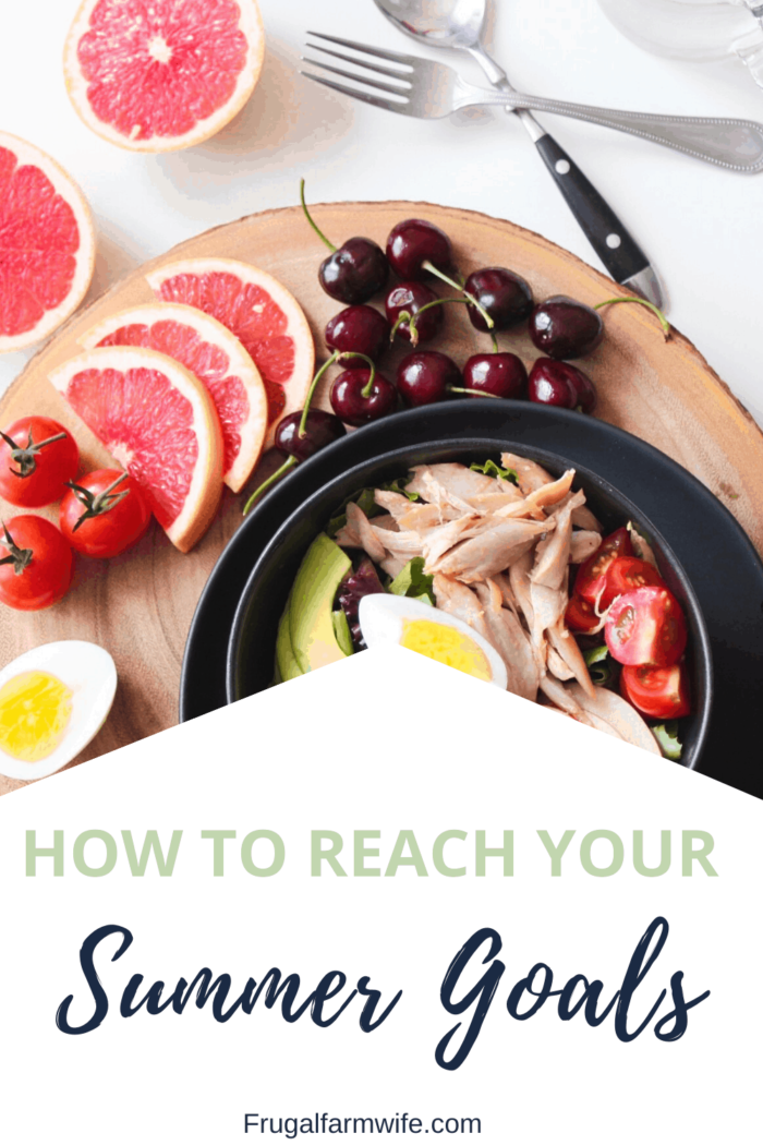 Image shows a plate of fruits and a salad with text that reads "How to Reach Your Summer Health Goals"
