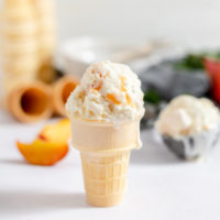 peach cobbler ice cream served in a cone