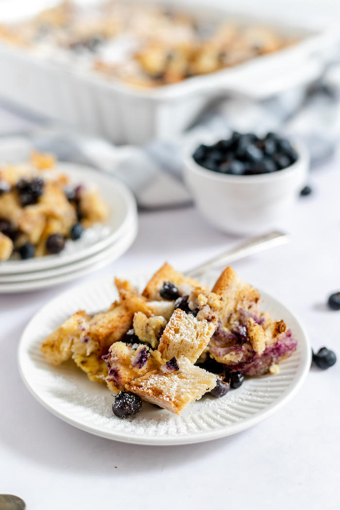 french toast bake served on a plate with blueberries