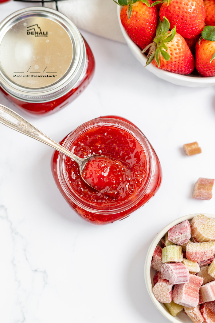jars of canned strawberry rhubarb jam