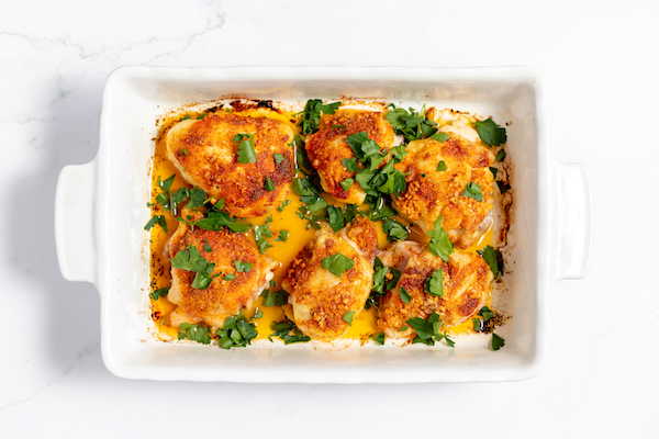 parsley on baked chicken thighs