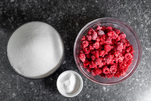 ingredients for making raspberry jam